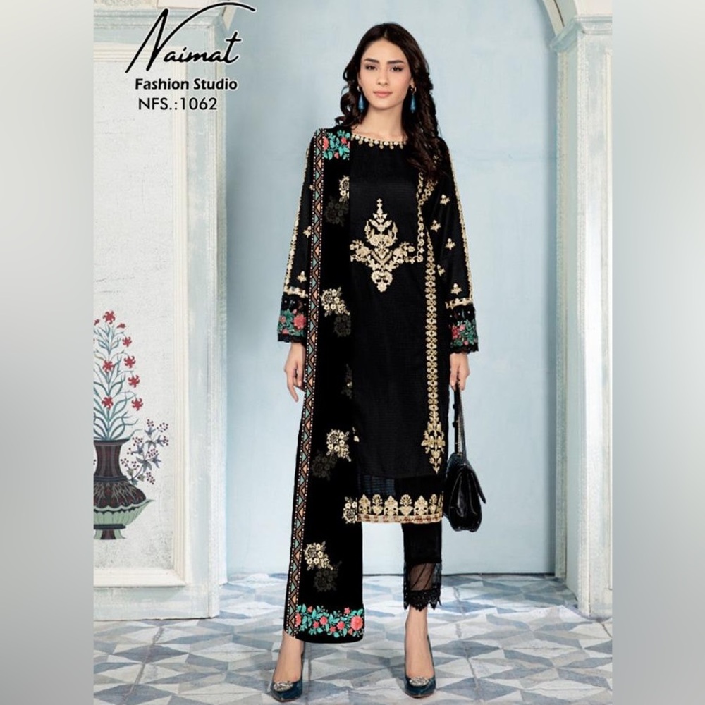 Designer Tunic Embellished with beautiful embroidery work in top and slive